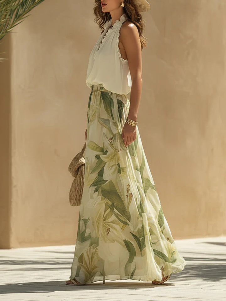 Alessandra - Top senza maniche in chiffon con volant e pantaloni con stampa di gigli