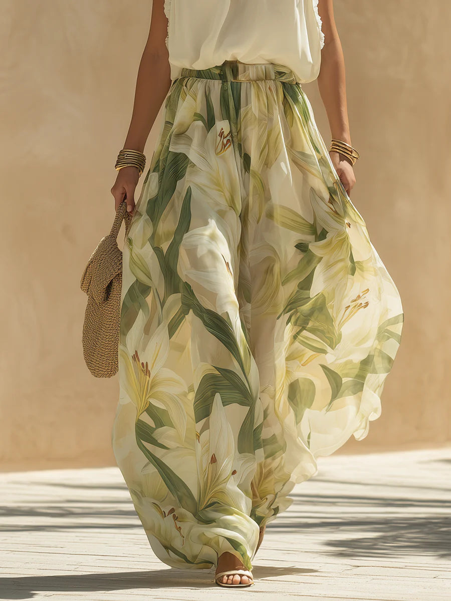 Alessandra - Top senza maniche in chiffon con volant e pantaloni con stampa di gigli