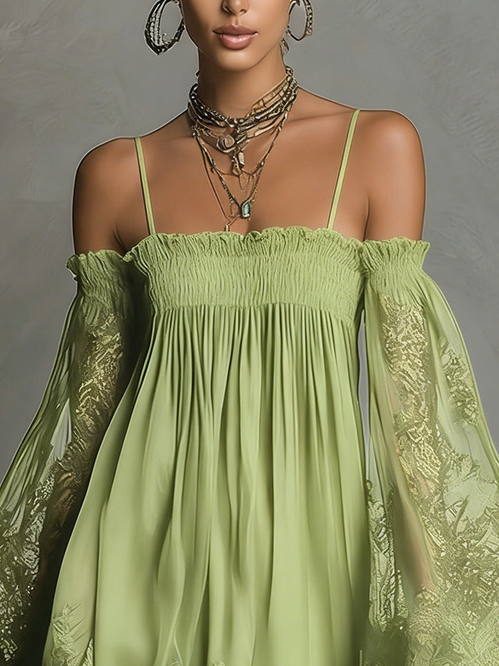 Noemi | Mini abito in chiffon blu navy con scollatura off-the-shoulder, rifiniture in pizzo e maniche trasparenti