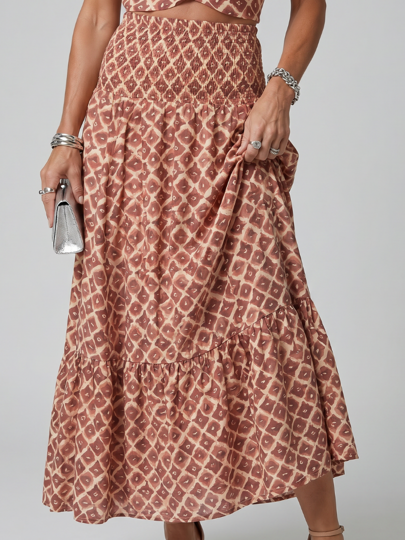 Amira | Abito midi con scollo a halter incrociato e stampa geometrica