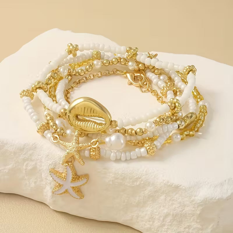 Set di 6 Bracciali in Oro Costiero e Perle