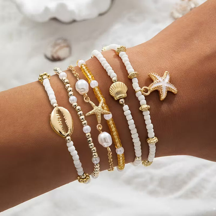 Set di 6 Bracciali in Oro Costiero e Perle