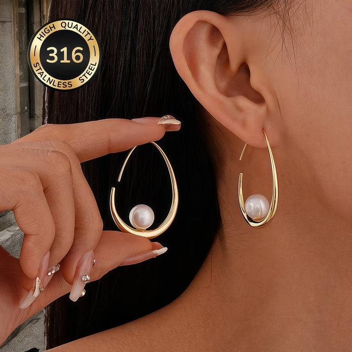 Orecchini a cerchio con perla crescent