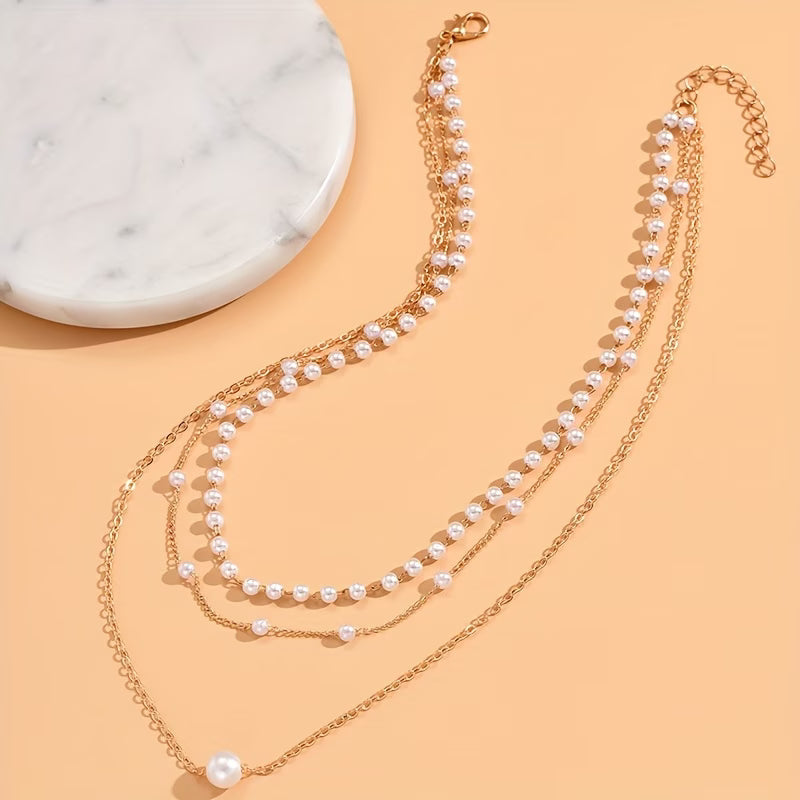 Il set di collane a strati Trinity Pearl