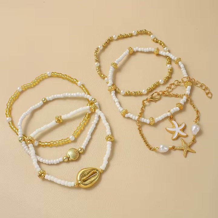 Set di 6 Bracciali in Oro Costiero e Perle