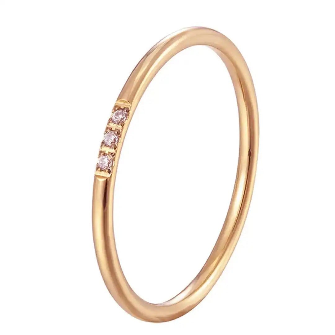 Anello Delicato a Tre Pietre