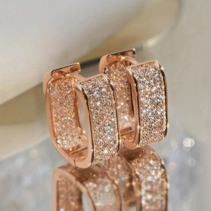 Orecchini Huggie Hoop Pavelina