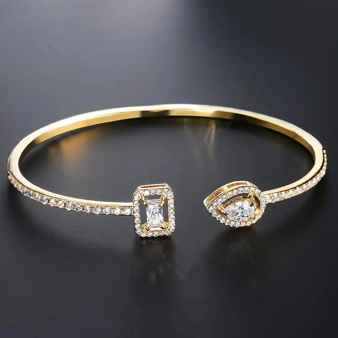 Bracciale Aperto in Oro con Due Pietre