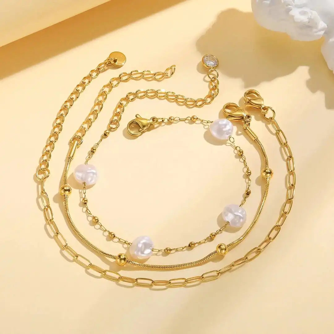 Set di Bracciali Impilabili con Perle Dorate