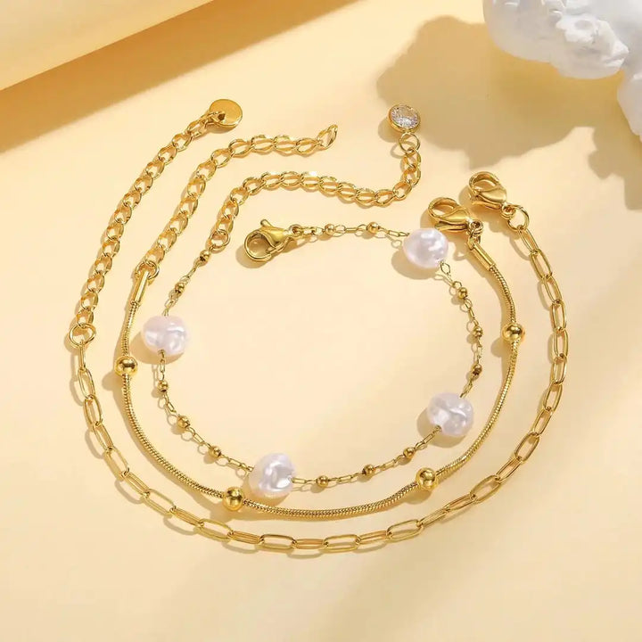 Set di Bracciali Impilabili con Perle Dorate