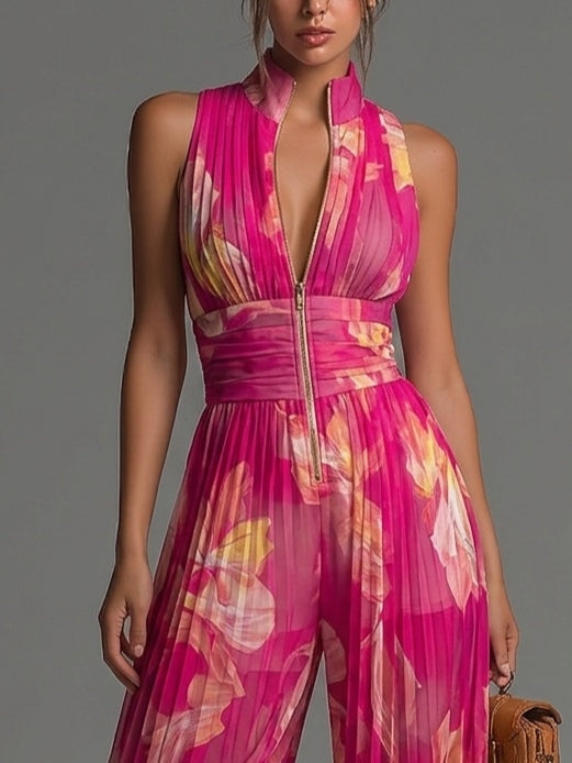 Tuta senza maniche a zip plissettata in chiffon con stampa floreale fucsia