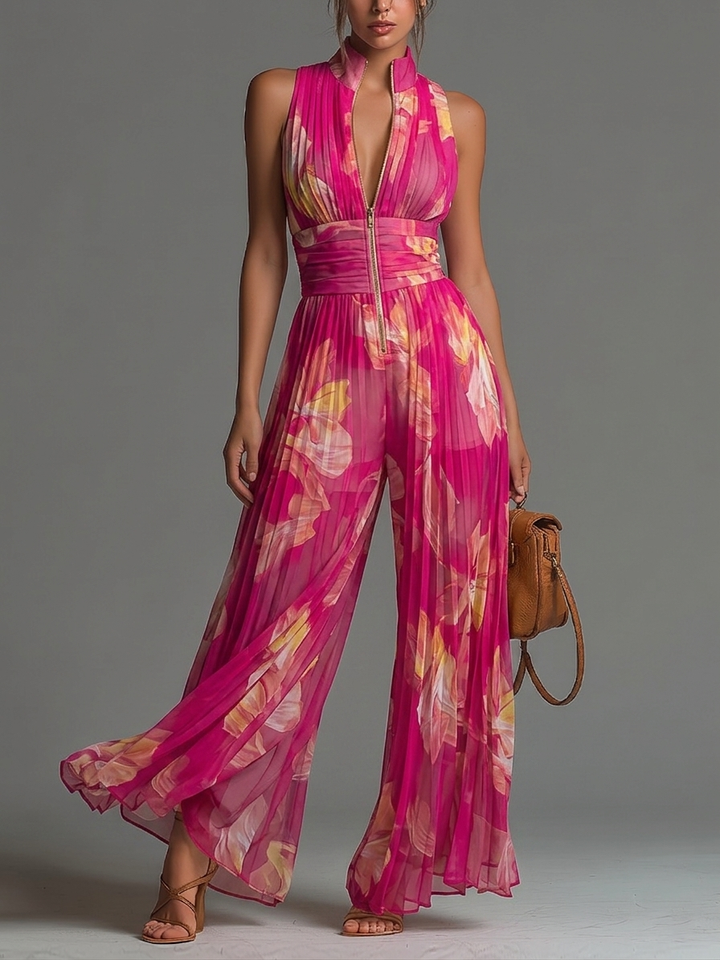 Tuta senza maniche a zip plissettata in chiffon con stampa floreale fucsia