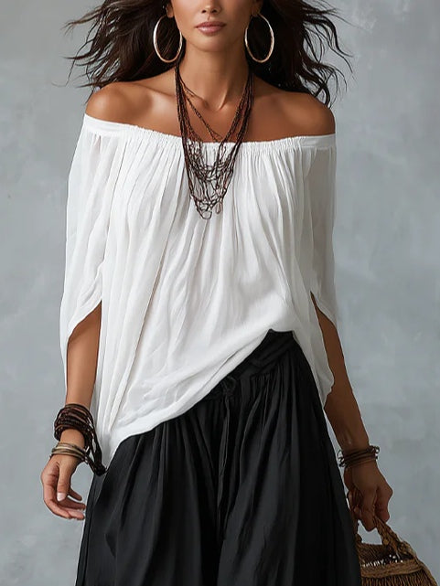 Top Bianco Off-the-Shoulder e Pantaloni Lantern Larghi