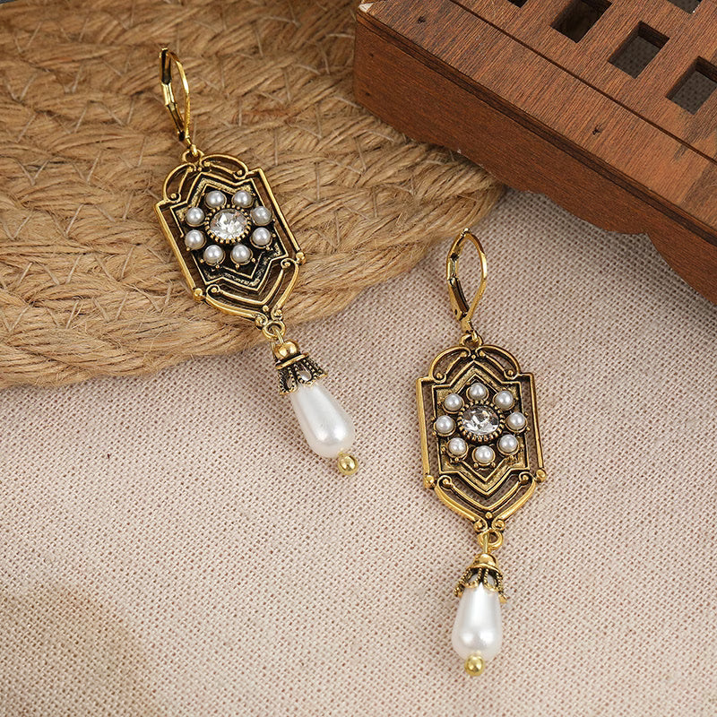 Orecchini Vintage Incastonati in Oro e Perle