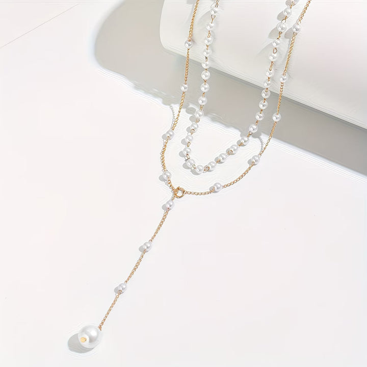 Collana a filo di perle graduate